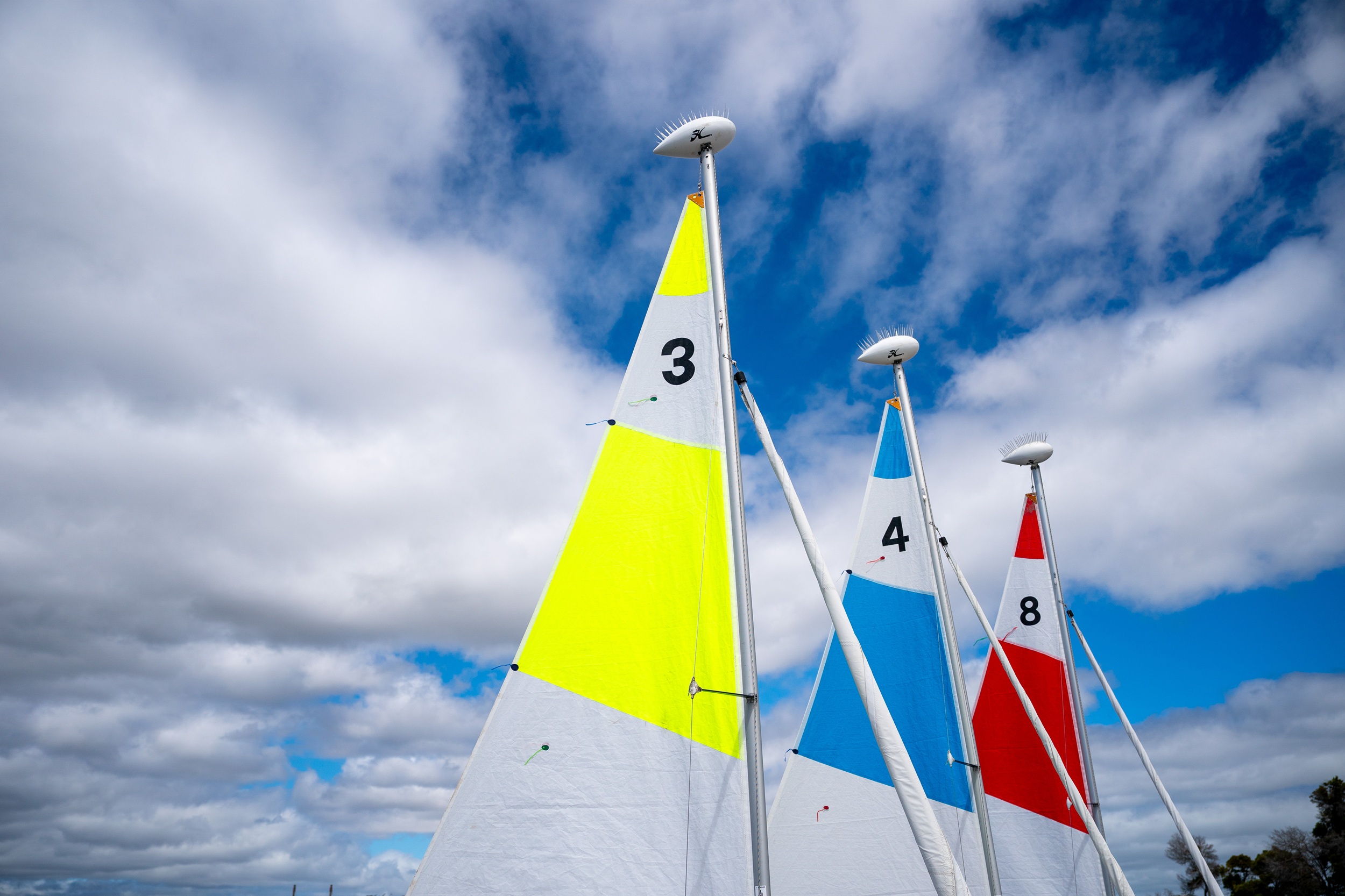 Three Mainsails at Shoreline Lake. Three Mainsails at Shoreline Lake.